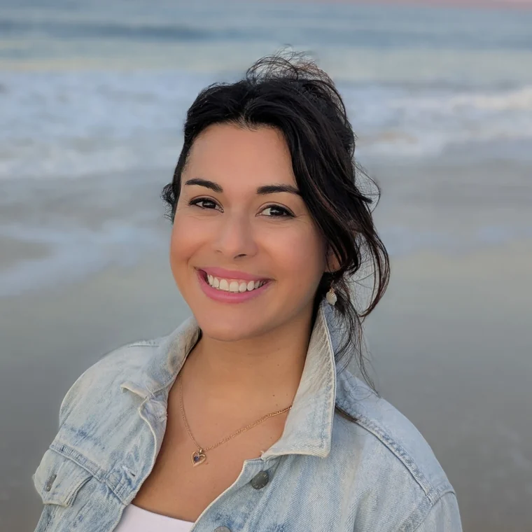 Jennifer Rodriguez Ruiz, counsellor and founder of Natural Zen Counselling, on the beach at dusk